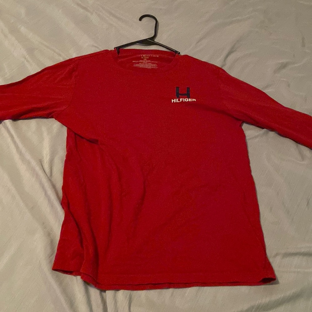 red hilfiger shirt it’s in perfect condition just got to small